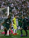 <p>Luiz Otavio (left) of Chapecoense celebrates scoring </p>