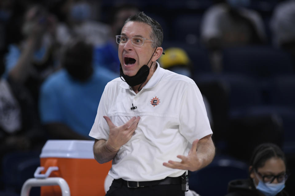 Connecticut Sun head coach Curt Miller yells to his players during the first half of Game 3 of a WNBA semifinal playoff basketball game against the Chicago Sky, Sunday, Oct. 3, 2021, in Chicago. Chicago won 86-83. (AP Photo/Paul Beaty)