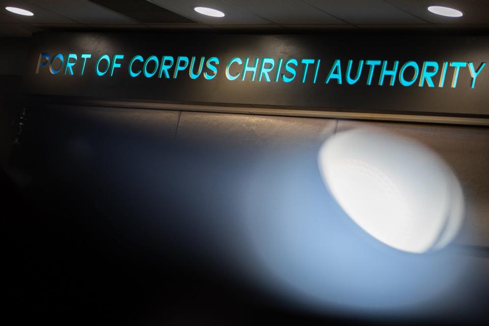 A sign hangs above the Port of Corpus Christi Authority commissioners bench at the Port's headquarters on May 24, 2022.