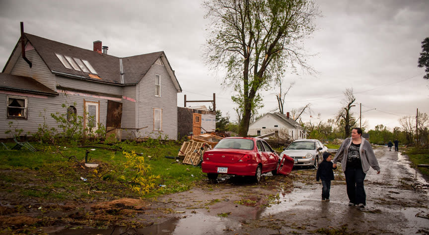 THURMAN, IA - APRIL 14: People begin to pick up the pieces after the town was hit by an apparent tornado April 14, 2012 in Thurman, Iowa. The storms were part of a massive system that affected areas from Northern Nebraska south through Oklahoma.