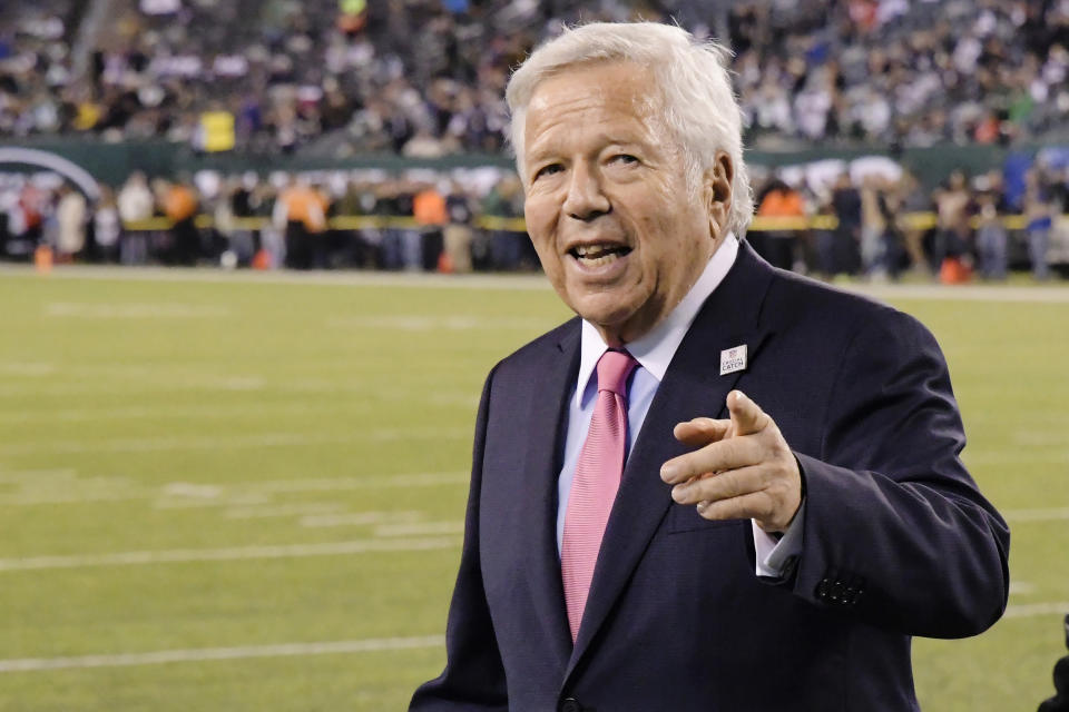 FILE - In this Oct. 21, 2019, file photo, New England Patriots owner Robert Kraft points to fans as his team warms up before an NFL football game against the New York Jets, in East Rutherford, N.J. A Florida appeals court ruled Wednesday, Aug. 19, 2020, that police violated the rights of New England Patriots owner Robert Kraft and others when they secretly video recorded them paying for massage parlor sex acts, barring the tapes' use at trial and dealing a potentially deadly blow to their prosecution. (AP Photo/Bill Kostroun, File)