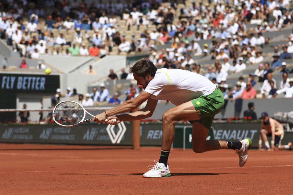 Russia's Daniil Medvedev plays a shot against Brazil's Thiago Seyboth Wild during their first round match of the French Open tennis tournament at the Roland Garros stadium in Paris, Tuesday, May 30, 2023. (AP Photo/Aurelien Morissard)