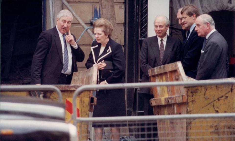 Margaret Thatcher views of the aftermath of the IRA bombing of the Carlton Club, London, in 1990.