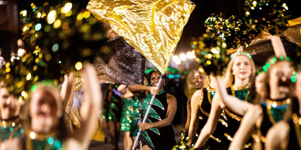 Members of the Fort Myers High School band perform during the 2023 Edison Festival of Light Grand Parade in Fort Myers on Saturday, Feb. 18, 2023.  