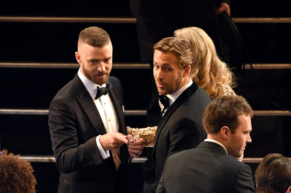 Justin Timberlake (left) catches up with former roomie Ryan Gosling at the 89th Annual Academy Awards in 2017