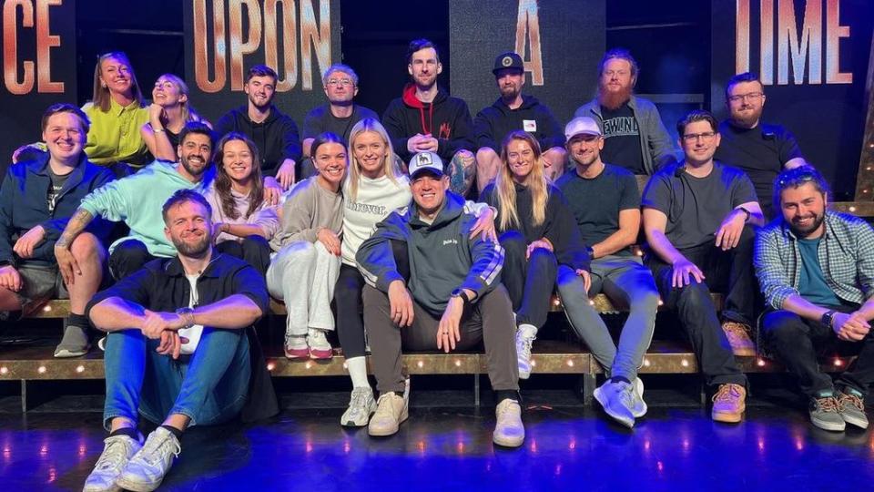 Nadiya and Kai posing with the team behind their successful tour