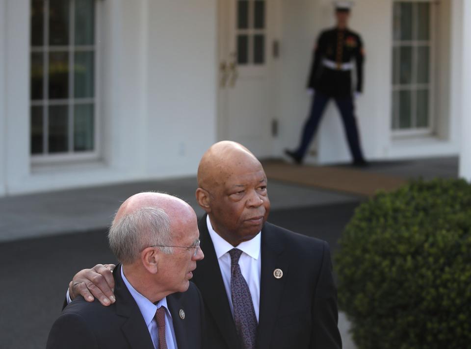 Reps. Elijah Cummings and Peter Welch outside the White House after a meeting with President Trump. (Getty)