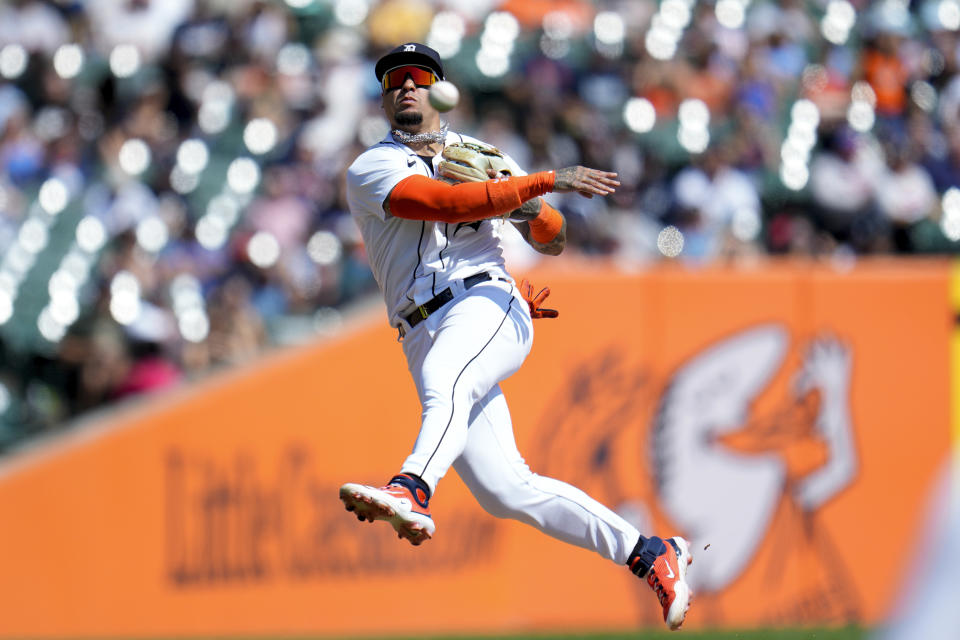 Detroit Tigers shortstop Javier Baez (28) throws to first base on a Houston Astros' Jeremy Pena ground ball in the fifth inning of a baseball game, Sunday, Aug. 27, 2023, in Detroit. Pena beat the throw for a single. (AP Photo/Paul Sancya)