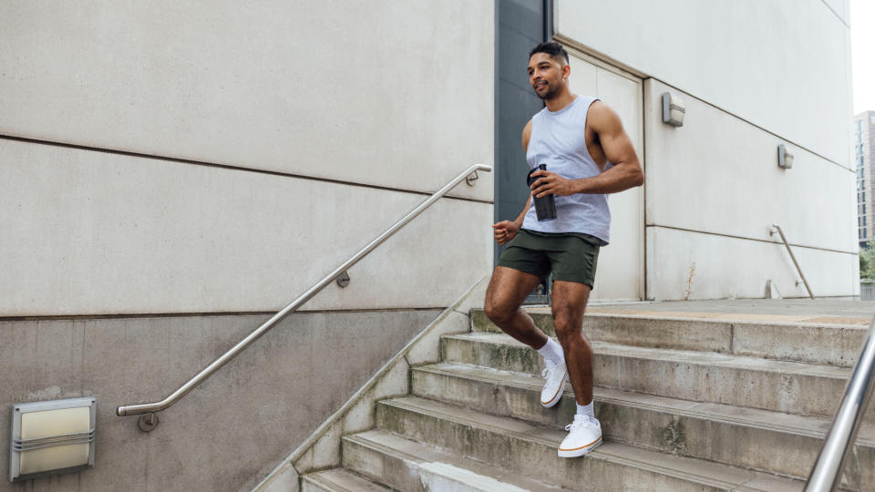 Man walking down stairs