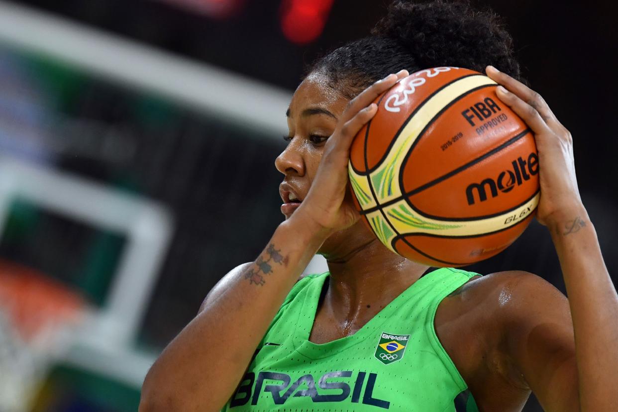 Brazil's small forward Damiris Dantas holds on to the ball during a Women's round Group A basketball match between Turkey and Brazil at the Youth Arena in Rio de Janeiro on August 13, 2016 during the Rio 2016 Olympic Games.