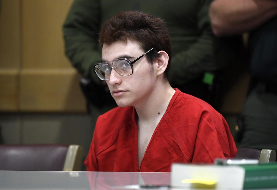 ADDS “SUSPECT” - Parkland school shooting suspect Nikolas Cruz sits at the defense table for a hearing at the Broward Courthouse in Fort Lauderdale, Fla., on Friday, March 22, 2019. (Taimy Alvarez/South Florida Sun-Sentinel via AP, Pool)