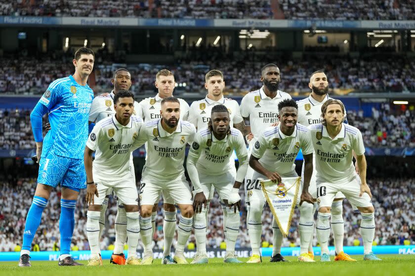 Real Madrid players pose ahead of the Champions League semifinal first leg soccer match.