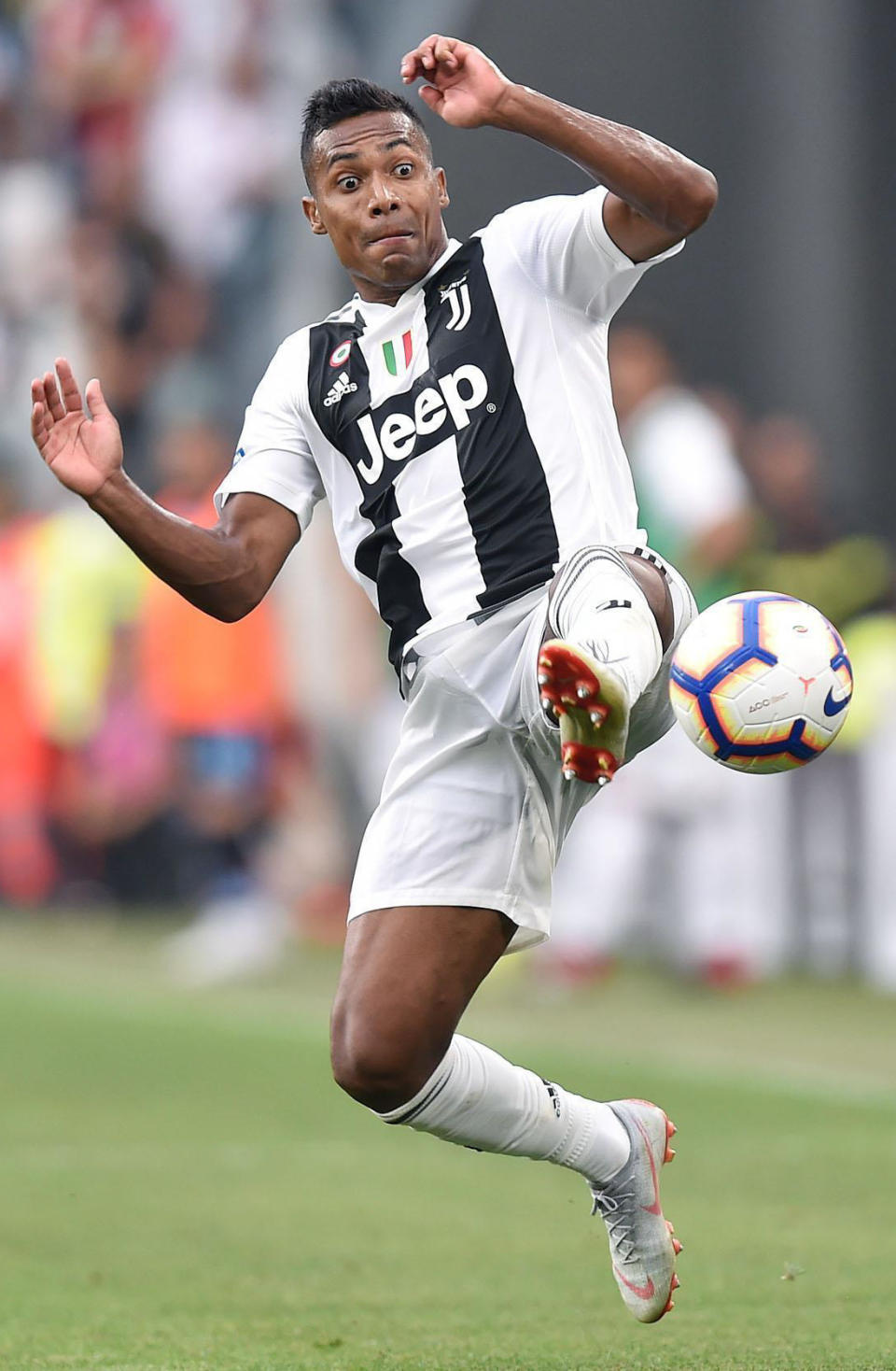 FILE -- In this Aug. 25, 2018 file photo, Juventus' Alex Sandro controls the ball during the Serie A soccer match between Juventus and Lazio at the Allianz Stadium in Turin, Italy. Alex Sandro has renewed his contract with Juventus until 2023, Juventus announced with a statement on its website Thursday, Dec. 20, 2018. (Alessandro Di Marco/ANSA via AP)