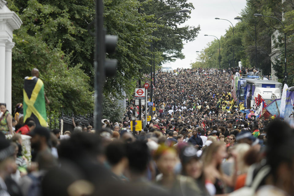 <p>Crowds on Ladbroke Grove take part in the parade during the Notting Hill Carnival in London, Monday, Aug. 27, 2018. (Photo: Tim Ireland/AP) </p>