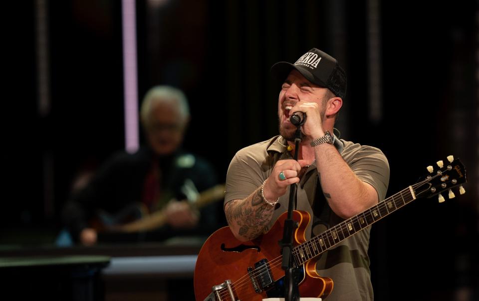 Kameron Marlowe performs during the Opry NextStage Live concert hosted by Lainey Wilson at the Grand Ole Opry in Nashville, Tenn., Wednesday, Dec. 6, 2023.