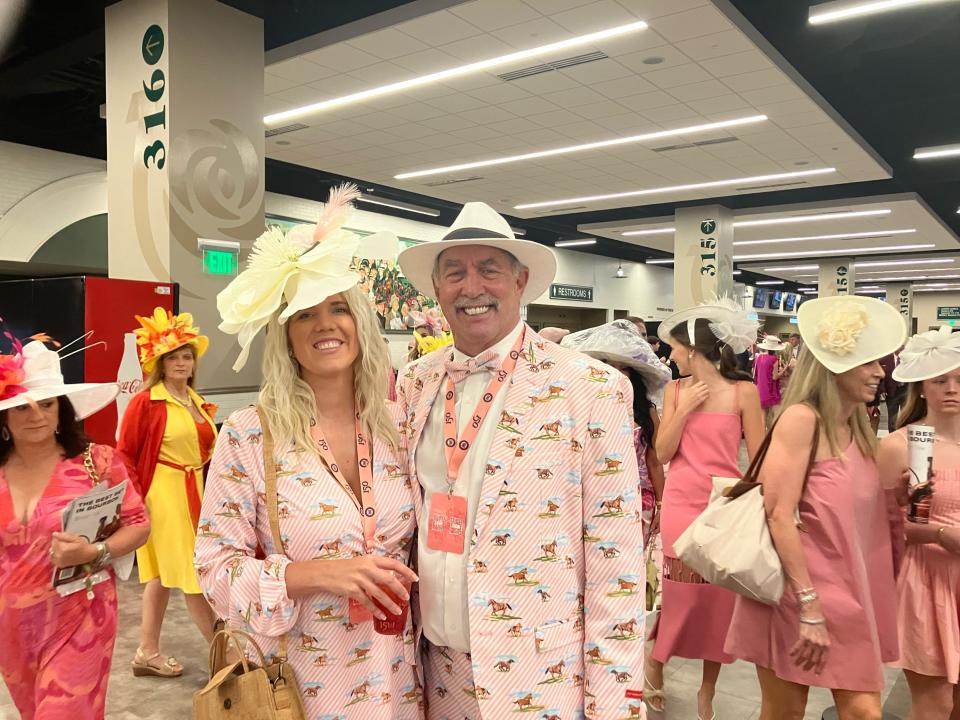 Tera and Rod Tinney didn’t let the soggy weather of Kentucky Oaks Day dampen their spirits on Friday morning on May 3, 2024.