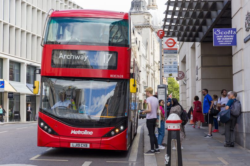 A bus at a stop in Central London