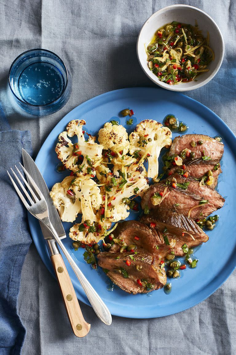 <p>Spruce up a classic steak dish with this colorful, bursting-with-flavor relish.</p><p><em><a href="https://www.womansday.com/food-recipes/food-drinks/recipes/a60517/steak-and-cauliflower-with-caper-relish-recipe/" rel="nofollow noopener" target="_blank" data-ylk="slk:Get the Steak and Cauliflower with Caper Relish recipe.;elm:context_link;itc:0;sec:content-canvas" class="link ">Get the Steak and Cauliflower with Caper Relish recipe.</a></em></p>
