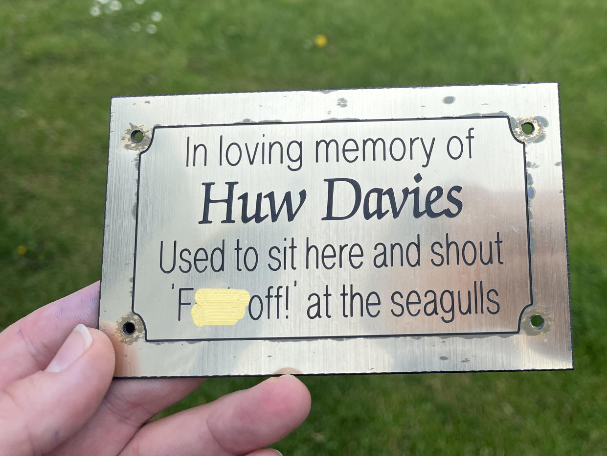 A memorial bench plaque in Aberystwyth, Wales, dedicated to ''Huw Davies. (SWNS)