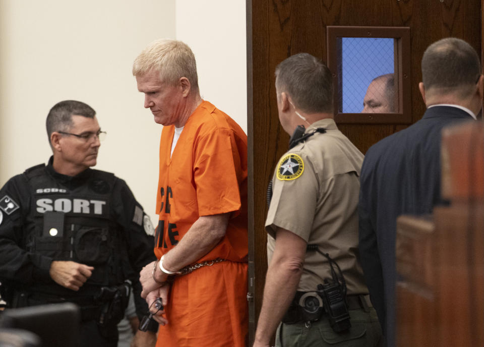 Alex Murdaugh enters the courtroom for his sentencing for stealing from 18 clients, Tuesday, Nov. 28, 2023, at the Beaufort County Courthouse in Beaufort, S.C. (Andrew J. Whitaker/The Post And Courier via AP, Pool)