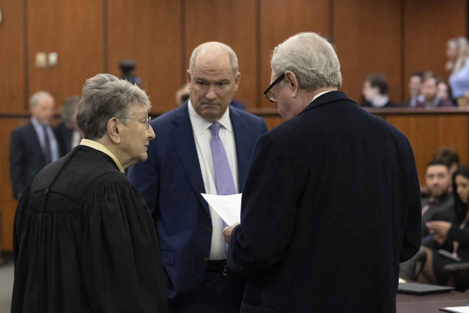 Judge Jean Toal, left, speaks with defense attorneys Jim Griffin, center, and Dick Harpootlian, right, before a judicial hearing at the Richland County Judicial Center in Columbia, S.C., Monday, Jan. 29, 2024. (Tracy Glantz/The State via AP, Pool)