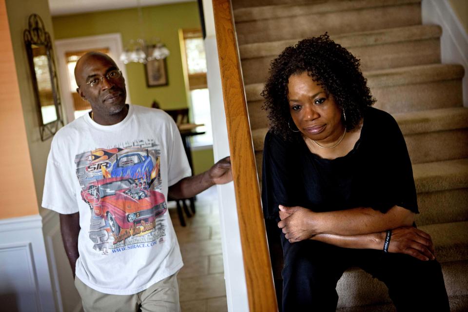 Michael, left, and Patricia Jackson are photographed in their home Saturday, June 16, 2012, in Marietta, Ga. On a suburban cul-de-sac northwest of Atlanta, the Jacksons are struggling to keep a house worth $100,000 less than they owe. Their voices and those of many others tell the story of a country that, for all the economic turmoil of the past few years, continues to believe things will get better. But until it does, families are trying to hang on to what they've got left. The Great Recession claimed nearly 40 percent of Americans' wealth, the Federal Reserve reported last week. The new figures, showing Americans' net worth has plunged back to what it was in 1992, left economists shuddering. (AP Photo/David Goldman)