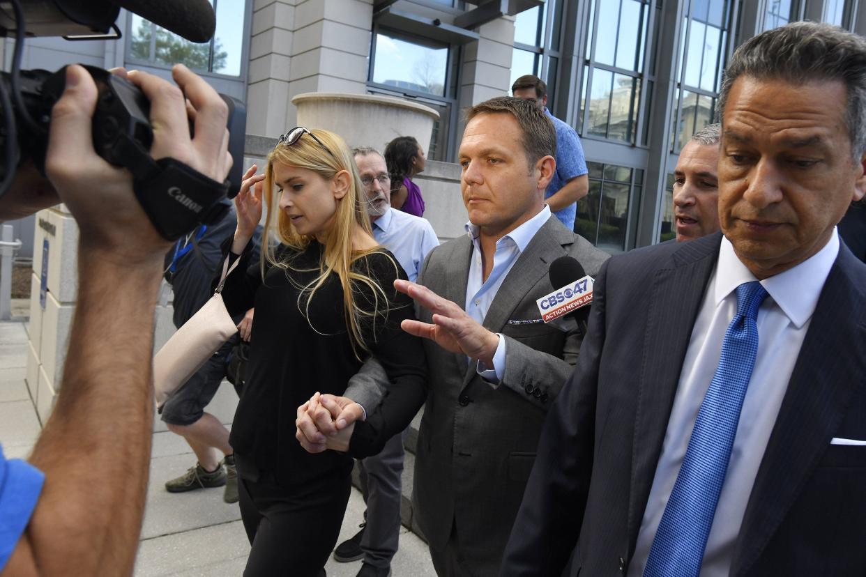 Former JEA CEO Aaron Zahn leaves the federal courthouse after his first appearance on fraud and conspiracy charges Tuesday, March 8, 2022.