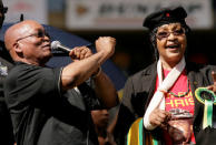 FILE PHOTO: African National Congress (ANC) president Jacob Zuma (L) sings next to Winnie Madikizela Mandela during their final election rally in Johannesburg April19, 2009. REUTERS/Siphiwe Sibeko/File Photo