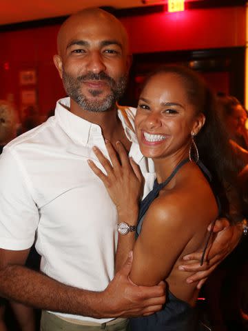 <p>Bruce Glikas/FilmMagic</p> Olu Evans and Misty Copeland pose at The Opening Night After Party for "Hedwig and The Angry Inch" on Broadway on July 22, 2015.