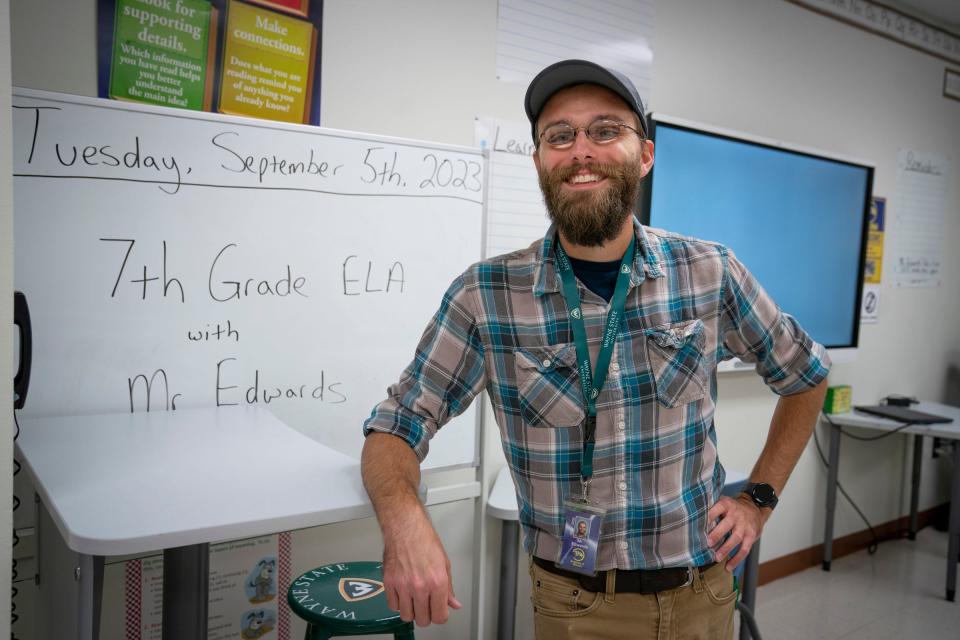 David Edwards, 31, of St. Clair Shores, and an English teacher at Academy of Warren is photographed preparing for the school year in his classroom on Thursday, Aug. 31, 2023. Edwards is looking at paying $334.31 a month when his student loan payments resume on Oct. 5.