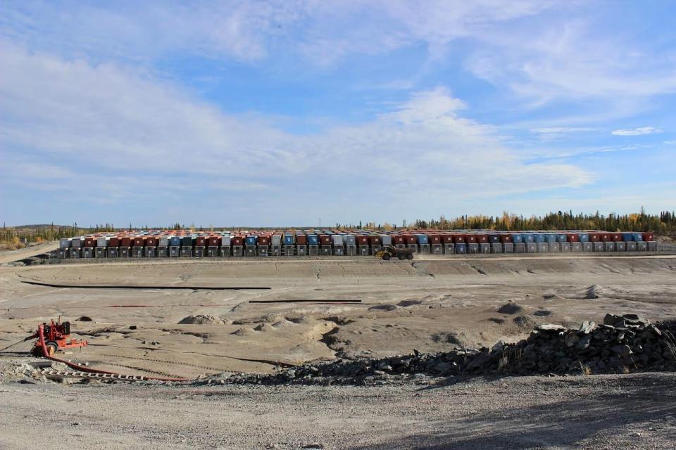 Giant mine's infamous gold roaster, which spewed arsenic trioxide into the air without any pollution controls from 1949 to 1951, is now stored in these 365 shipping containers. Their contents will eventually be buried in one of the pits and frozen by thermosiphons.