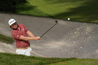 Cameron Smith, of Australia, hits out of a bunker on the 10th hole during the final round of the Masters golf tournament Sunday, Nov. 15, 2020, in Augusta, Ga. (AP Photo/Chris Carlson)