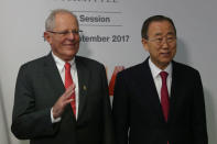 Peru's President Pedro Pablo Kuczynski and former UN Secretary-General Ban Ki-moon pose for picture during the 131st IOC session in Lima, Peru, September 14, 2017. REUTERS/Guadalupe Pardo