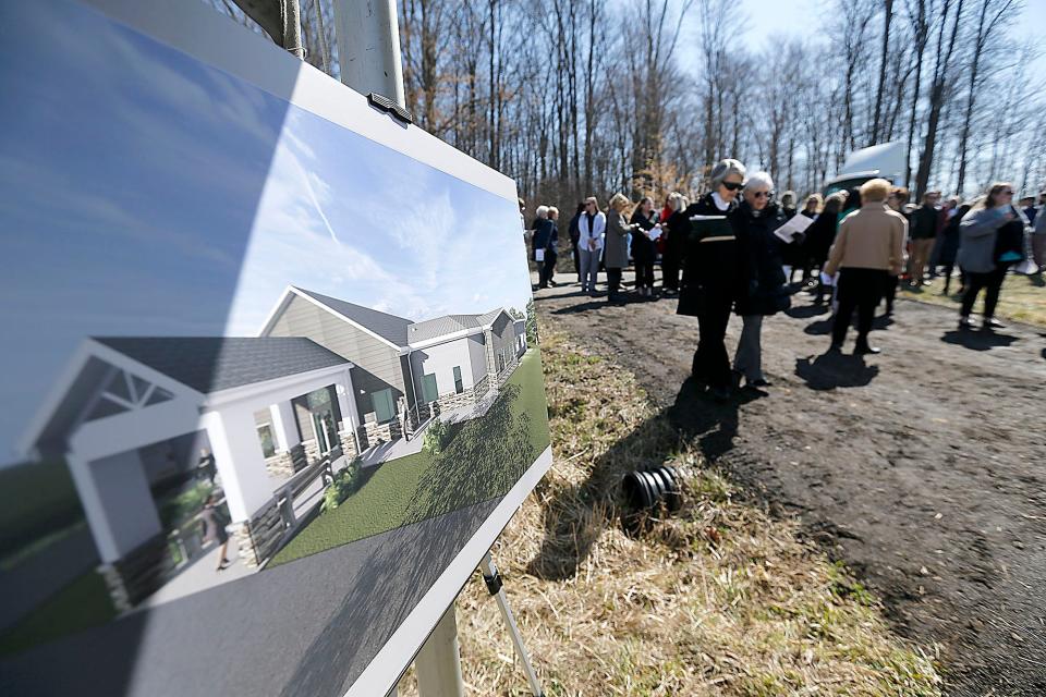 Roughly 75 community members gather Thursday for a groundbreaking ceremony in the Ashland Business Park, at the site of the Foundations Community Childcare center, which will be constructed on Ford Drive.