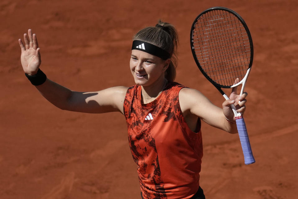 Karolina Muchova of the Czech Republic celebrates winning her fourth round match of the French Open tennis tournament at the Roland Garros against Russia's Elina Avanesyan stadium in Paris, Sunday, June 4, 2023. (AP Photo/Christophe Ena)