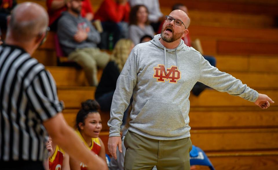 Mater Dei head coach Chad Breeden pleads his case with one of the referees as the Mater Dei Wildcats play the Memorial Tigers in the first round of the girls Southern Indiana Athletic Conference tournament at Memorial Tuesday, January 14, 2020.