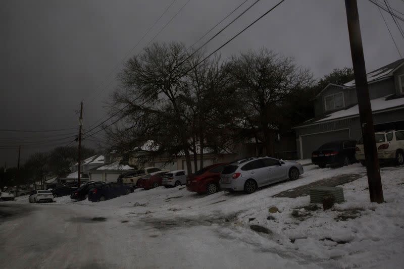 FILE PHOTO: A neighborhood experiences a power outage after winter weather caused electricity blackouts in San Marcos