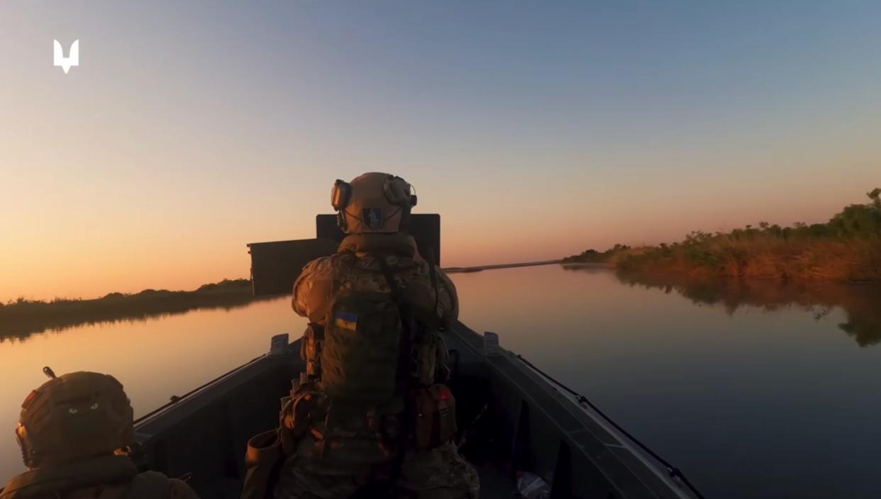 Elite Ukrainian naval forces raiding a Russian-occupied island in the Dnipro river.