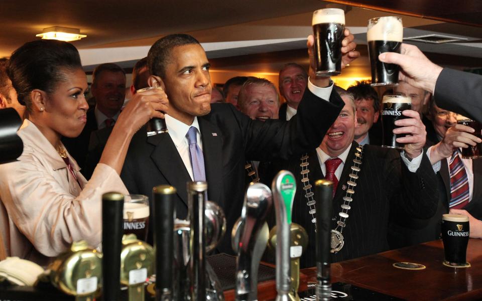 Barack Obama has the look of a man who knows he's about to do something cliched - Credit: Alamy