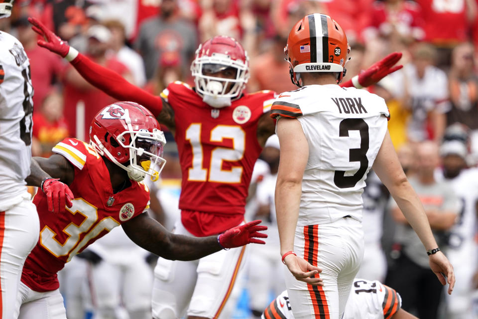 Kansas City Chiefs cornerback Dicaprio Bootle (30) and quarterback Shane Buechele (12) react to a missed 43-yard field goal attempt by Cleveland Browns place-kicker Cade York (3) late in the second half of an NFL preseason football game Saturday, Aug. 26, 2023, in Kansas City, Mo. The Chiefs won 33-32. (AP Photo/Ed Zurga)