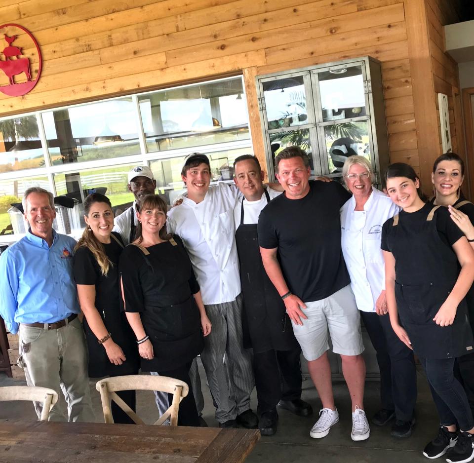 Celebrity chef Tyler Florence, center in black, dropped by Rosy Tomorrows Heritage Farm in North Fort Myers when he in town to film an episode of "The Great Food Truck Race" in 2019.