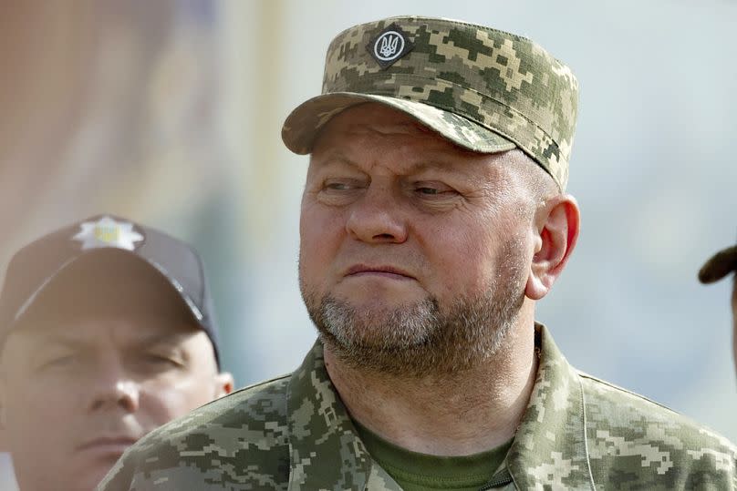 Commander-in-Chief of Ukraine's Armed Forces Valerii Zaluzhnyi, front, attends an event for marking Statehood Day in Mykhailivska Square in Kyiv, on July 28, 2023.