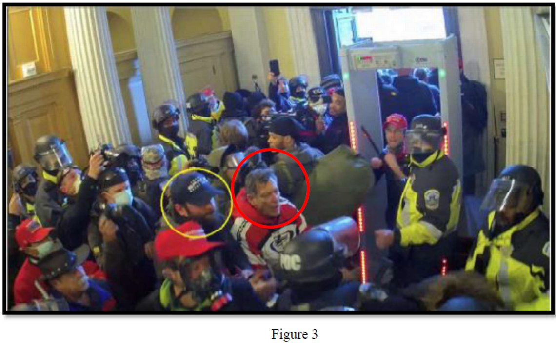 Taylor Taranto is seen clashing with Capitol police during the riot at the U.S. Capitol on Jan. 6, 2021, in this image included in court documents. Taranto is circled in yellow. David Walls-Kaufman, his codefendant in a lawsuit for wrongful death of MPD Officer Jeffrey Smith is circled in red.