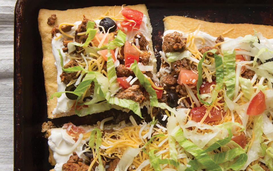 <p>Clare Barboza/Bonnie Matthews</p><p>This might just be better than Taco Bell's version.</p><p><strong>Get the recipe: <a href="https://parade.com/1046842/parade/mexican-pizza/" rel="nofollow noopener" target="_blank" data-ylk="slk:Mexican Pizza;elm:context_link;itc:0;sec:content-canvas" class="link ">Mexican Pizza</a></strong></p>