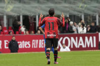 AC Milan's Christian Pulisic celebrates after scoring his side's opening goal during a Serie A soccer match between AC Milan and Empoli at the San Siro stadium in Milan, Italy, Sunday, March 10, 2024. (AP Photo/Luca Bruno)