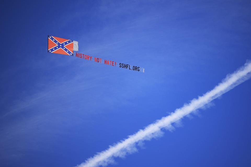 An airplane flies a Confederate-supporting message before a regular season NFL football matchup between the Jacksonville Jaguars and the Dallas Cowboys on Dec. 18 at TIAA Bank Field in Jacksonville.