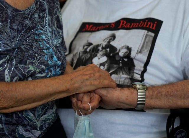 Martin Adler with the back-and-white photo on his T-shirt