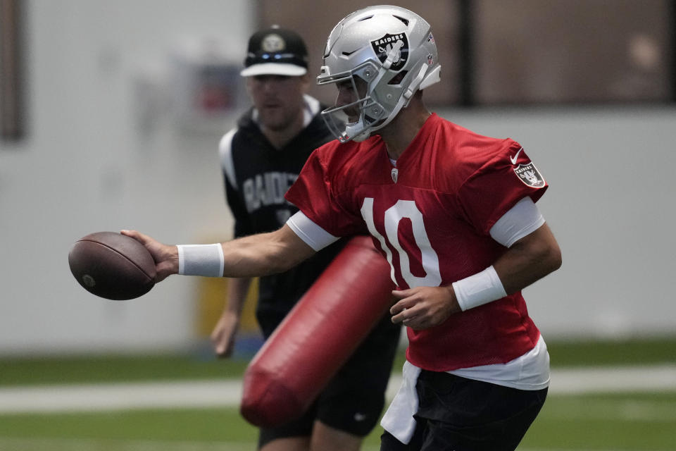 Las Vegas Raiders' Jimmy Garoppolo takes part during a practice at NFL football training camp Friday, Aug. 4, 2023, in Henderson, Nev. (AP Photo/John Locher)