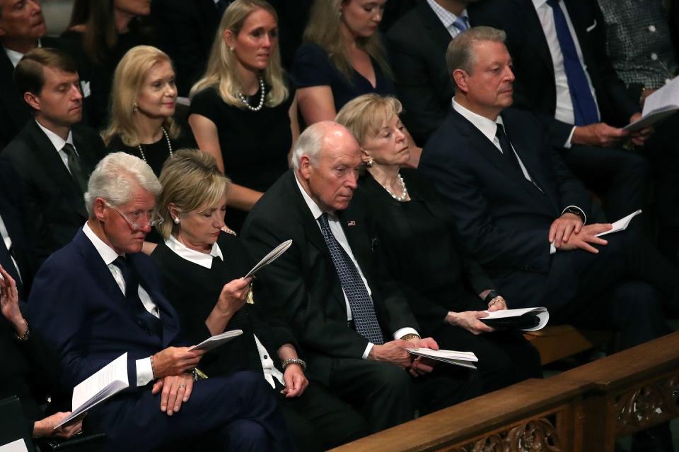 7) Former President Bill Clinton, former Secretary of State Hillary Clinton, former Vice President Dick Cheney, his wife Lynne, and former Vice President Al Gore attend the funeral.