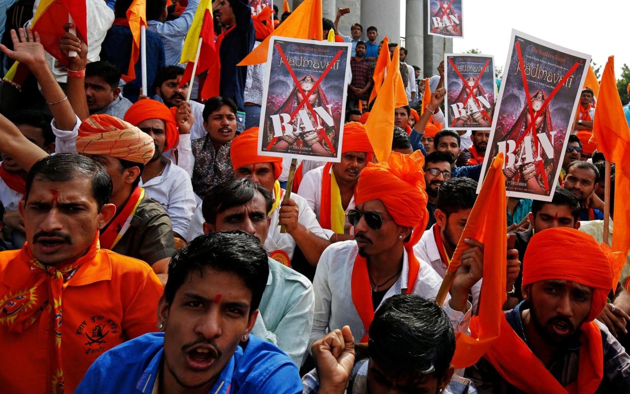  Demonstrators chant slogans as they protest against the release of the upcoming Bollywood movie 'Padmavati' in Bengaluru - REUTERS